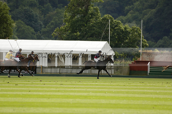 La Tremenda (lilac) v Maiz Dulce (yellow) in a Brecknock Cup polo match played on Lawns 1 at the Cowdray Park Polo Club on Tuesday 13 August 2013