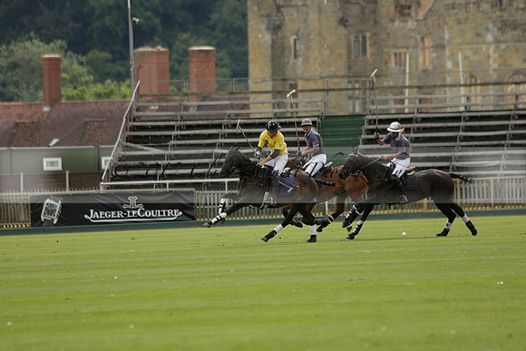 La Tremenda (lilac) v Maiz Dulce (yellow) in a Brecknock Cup polo match played on Lawns 1 at the Cowdray Park Polo Club on Tuesday 13 August 2013