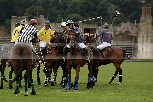 La Tremenda (lilac) v Maiz Dulce (yellow) in a Brecknock Cup polo match played on Lawns 1 at the Cowdray Park Polo Club on Tuesday 13 August 2013