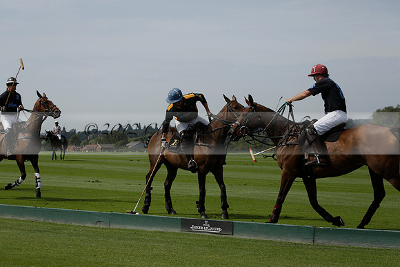 Maiz Dulce (green) v River (blue) in a Uber Polo Midsummer 12 goal polo match on Wednesday 21 August 2013 at Cowdray park Polo Club on Ambersham 2.  www.polopictures.co.uk