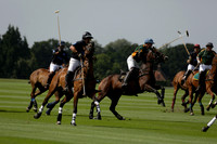 Maiz Dulce (green) v River (blue) in a Uber Polo Midsummer 12 goal polo match on Wednesday 21 August 2013 at Cowdray park Polo Club on Ambersham 2.  www.polopictures.co.uk