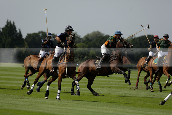 Maiz Dulce (green) v River (blue) in a Uber Polo Midsummer 12 goal polo match on Wednesday 21 August 2013 at Cowdray park Polo Club on Ambersham 2.  www.polopictures.co.uk