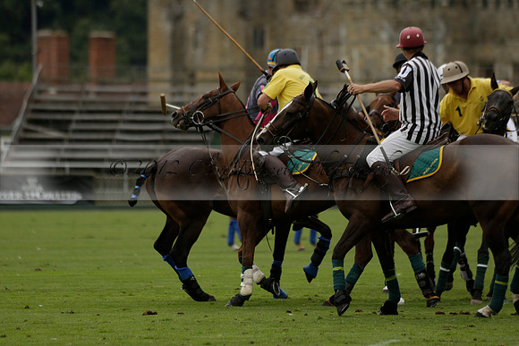 La Tremenda (lilac) v Maiz Dulce (yellow) in a Brecknock Cup polo match played on Lawns 1 at the Cowdray Park Polo Club on Tuesday 13 August 2013