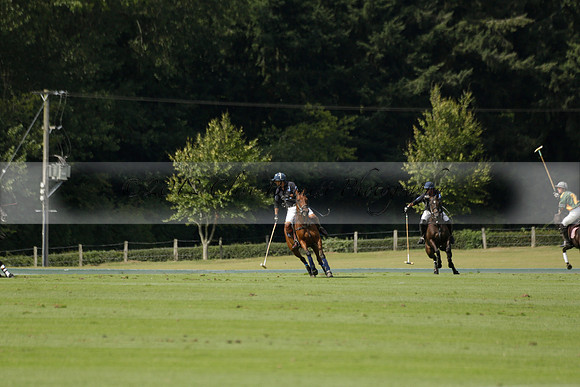 Maiz Dulce (green) v River (blue) in a Uber Polo Midsummer 12 goal polo match on Wednesday 21 August 2013 at Cowdray park Polo Club on Ambersham 2.  www.polopictures.co.uk