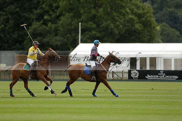 La Tremenda (lilac) v Maiz Dulce (yellow) in a Brecknock Cup polo match played on Lawns 1 at the Cowdray Park Polo Club on Tuesday 13 August 2013