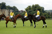 La Tremenda (lilac) v Maiz Dulce (yellow) in a Brecknock Cup polo match played on Lawns 1 at the Cowdray Park Polo Club on Tuesday 13 August 2013