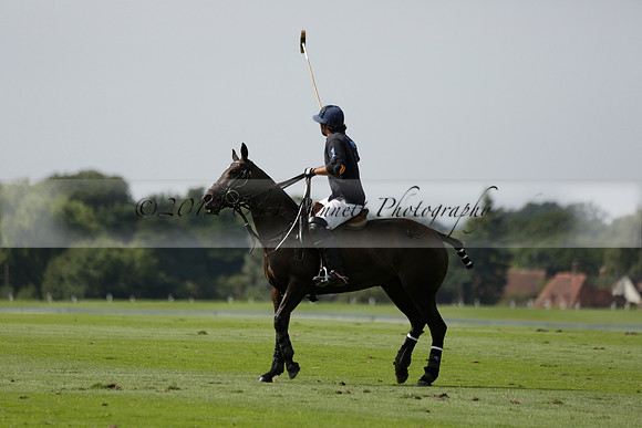 Maiz Dulce (green) v River (blue) in a Uber Polo Midsummer 12 goal polo match on Wednesday 21 August 2013 at Cowdray park Polo Club on Ambersham 2.  www.polopictures.co.uk