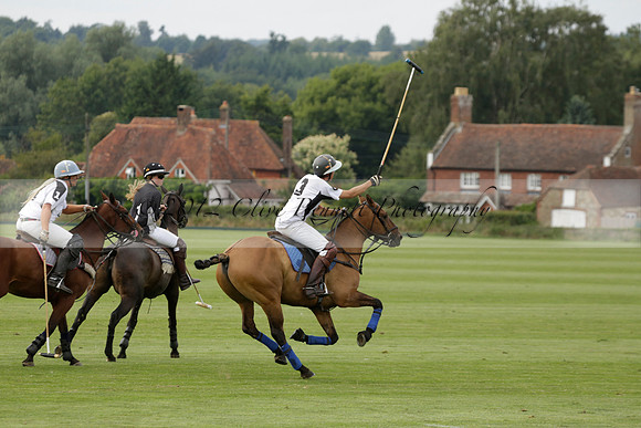Beau Design v Boscom in an August Rother Cup 4 goal polo match at Cowdray Park Polo Club on Wednesday 07 August 2013