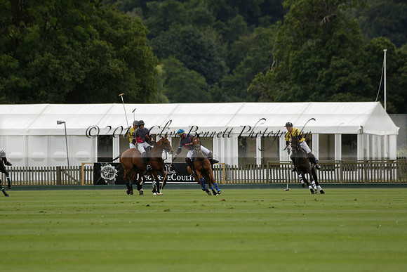 La Tremenda (lilac) v Maiz Dulce (yellow) in a Brecknock Cup polo match played on Lawns 1 at the Cowdray Park Polo Club on Tuesday 13 August 2013