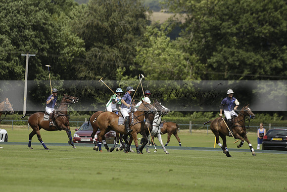 Burningfold (blue) v Wairakei Pastoral (green) in the Ruins Cup Final on Sunday 04 August 2013.
