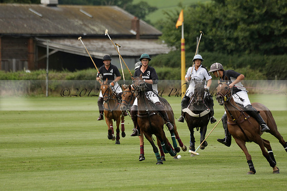 Beau Design v Boscom in an August Rother Cup 4 goal polo match at Cowdray Park Polo Club on Wednesday 07 August 2013