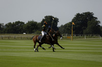 Maiz Dulce (green) v River (blue) in a Uber Polo Midsummer 12 goal polo match on Wednesday 21 August 2013 at Cowdray park Polo Club on Ambersham 2.  www.polopictures.co.uk