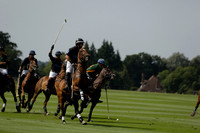 Maiz Dulce (green) v River (blue) in a Uber Polo Midsummer 12 goal polo match on Wednesday 21 August 2013 at Cowdray park Polo Club on Ambersham 2.  www.polopictures.co.uk