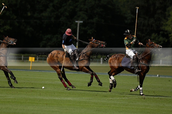 Maiz Dulce (green) v River (blue) in a Uber Polo Midsummer 12 goal polo match on Wednesday 21 August 2013 at Cowdray park Polo Club on Ambersham 2.  www.polopictures.co.uk