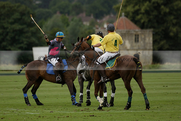La Tremenda (lilac) v Maiz Dulce (yellow) in a Brecknock Cup polo match played on Lawns 1 at the Cowdray Park Polo Club on Tuesday 13 August 2013