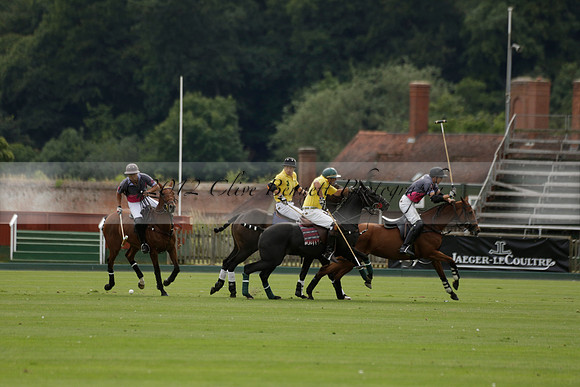La Tremenda (lilac) v Maiz Dulce (yellow) in a Brecknock Cup polo match played on Lawns 1 at the Cowdray Park Polo Club on Tuesday 13 August 2013