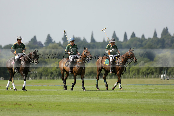 Maiz Dulce (green) v River (blue) in a Uber Polo Midsummer 12 goal polo match on Wednesday 21 August 2013 at Cowdray park Polo Club on Ambersham 2.  www.polopictures.co.uk