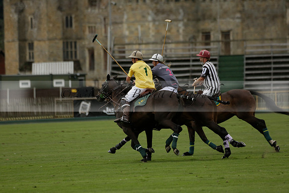 La Tremenda (lilac) v Maiz Dulce (yellow) in a Brecknock Cup polo match played on Lawns 1 at the Cowdray Park Polo Club on Tuesday 13 August 2013