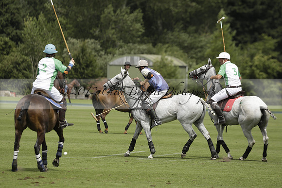 Burningfold (blue) v Wairakei Pastoral (green) in the Ruins Cup Final on Sunday 04 August 2013.
