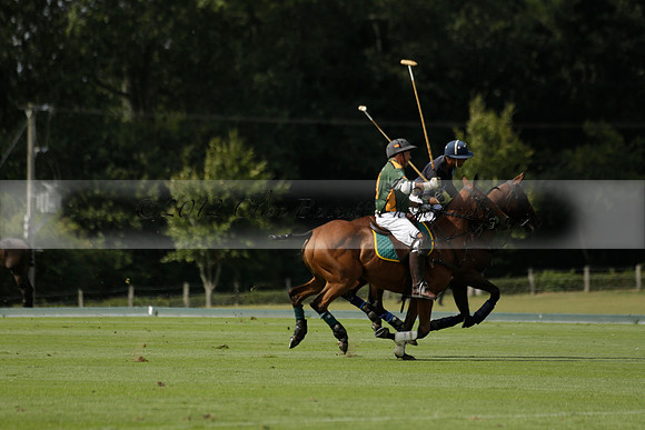 Maiz Dulce (green) v River (blue) in a Uber Polo Midsummer 12 goal polo match on Wednesday 21 August 2013 at Cowdray park Polo Club on Ambersham 2.  www.polopictures.co.uk