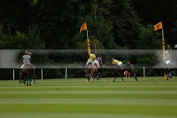 La Tremenda (lilac) v Maiz Dulce (yellow) in a Brecknock Cup polo match played on Lawns 1 at the Cowdray Park Polo Club on Tuesday 13 August 2013