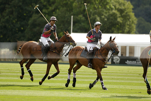 La Tremenda (lilac) v Maiz Dulce (yellow) in a Brecknock Cup polo match played on Lawns 1 at the Cowdray Park Polo Club on Tuesday 13 August 2013