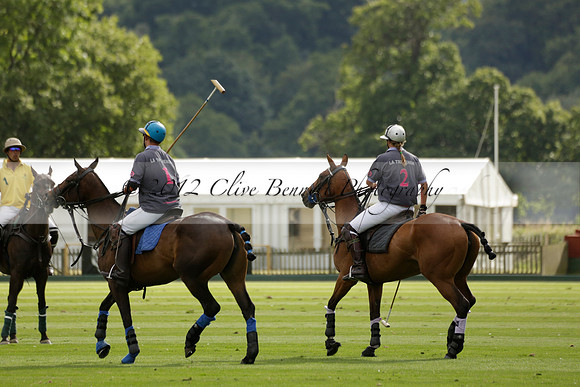 La Tremenda (lilac) v Maiz Dulce (yellow) in a Brecknock Cup polo match played on Lawns 1 at the Cowdray Park Polo Club on Tuesday 13 August 2013