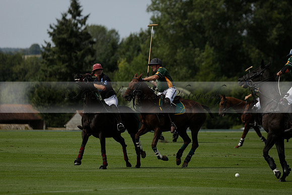 Maiz Dulce (green) v River (blue) in a Uber Polo Midsummer 12 goal polo match on Wednesday 21 August 2013 at Cowdray park Polo Club on Ambersham 2.  www.polopictures.co.uk