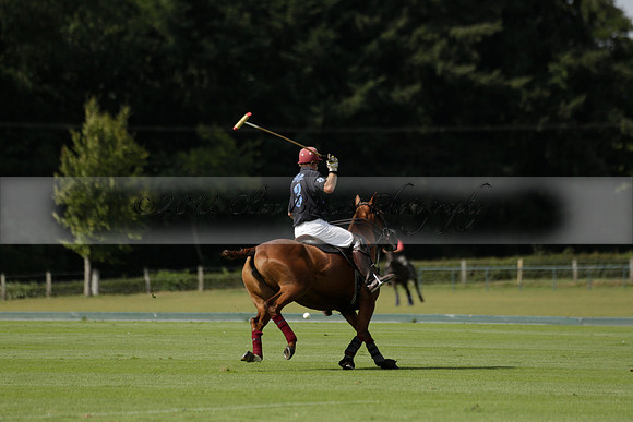 Maiz Dulce (green) v River (blue) in a Uber Polo Midsummer 12 goal polo match on Wednesday 21 August 2013 at Cowdray park Polo Club on Ambersham 2.  www.polopictures.co.uk