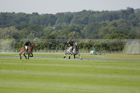 Maiz Dulce (green) v River (blue) in a Uber Polo Midsummer 12 goal polo match on Wednesday 21 August 2013 at Cowdray park Polo Club on Ambersham 2.  www.polopictures.co.uk