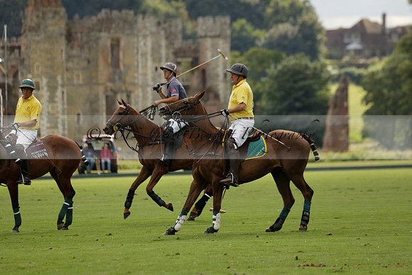 La Tremenda (lilac) v Maiz Dulce (yellow) in a Brecknock Cup polo match played on Lawns 1 at the Cowdray Park Polo Club on Tuesday 13 August 2013
