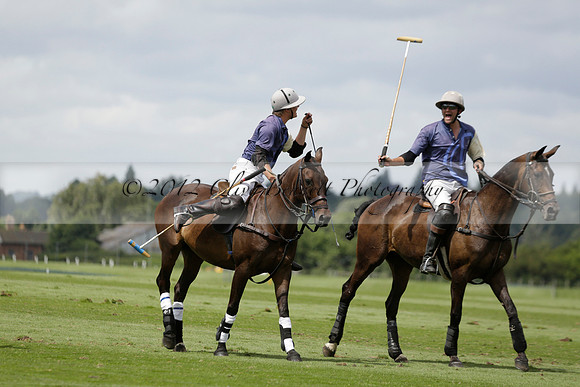 Burningfold (blue) v Wairakei Pastoral (green) in the Ruins Cup Final on Sunday 04 August 2013.