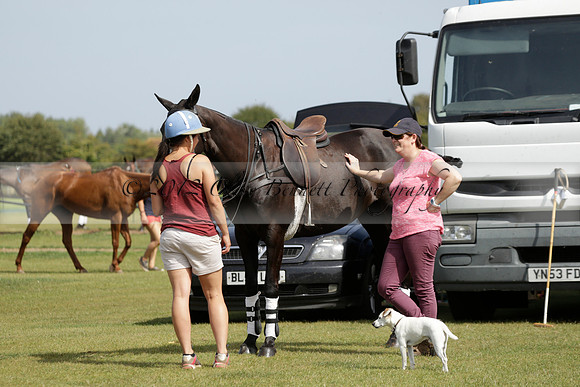 Maiz Dulce (green) v River (blue) in a Uber Polo Midsummer 12 goal polo match on Wednesday 21 August 2013 at Cowdray park Polo Club on Ambersham 2.  www.polopictures.co.uk