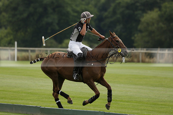 Beau Design v Boscom in an August Rother Cup 4 goal polo match at Cowdray Park Polo Club on Wednesday 07 August 2013