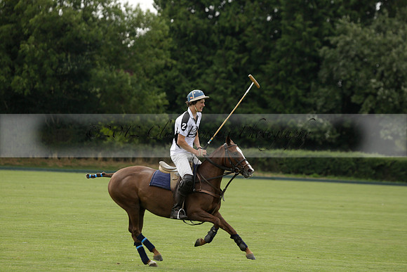 Beau Design v Boscom in an August Rother Cup 4 goal polo match at Cowdray Park Polo Club on Wednesday 07 August 2013