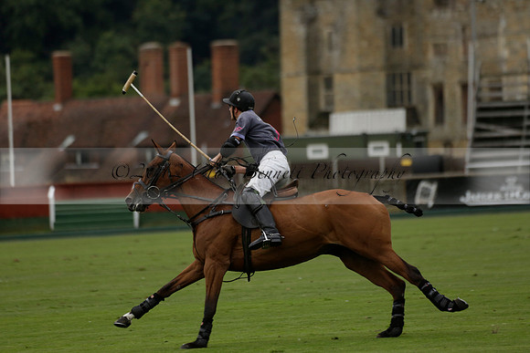 La Tremenda (lilac) v Maiz Dulce (yellow) in a Brecknock Cup polo match played on Lawns 1 at the Cowdray Park Polo Club on Tuesday 13 August 2013