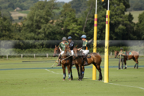 Maiz Dulce (green) v River (blue) in a Uber Polo Midsummer 12 goal polo match on Wednesday 21 August 2013 at Cowdray park Polo Club on Ambersham 2.  www.polopictures.co.uk