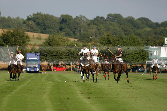 Pluma Negra (white) v Shoreline (black) in the Brecknock Cup Subsidiary final polo match played on Sunday 25 August 2013 at Cowdray Park Polo Club on Ambersham 1. 2013.10.12 www.polopictures.co.uk