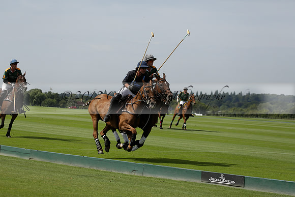 Maiz Dulce (green) v River (blue) in a Uber Polo Midsummer 12 goal polo match on Wednesday 21 August 2013 at Cowdray park Polo Club on Ambersham 2.  www.polopictures.co.uk