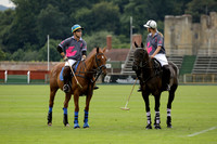La Tremenda (lilac) v Maiz Dulce (yellow) in a Brecknock Cup polo match played on Lawns 1 at the Cowdray Park Polo Club on Tuesday 13 August 2013