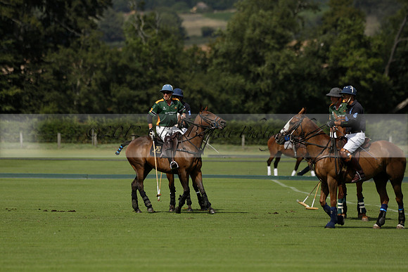 Maiz Dulce (green) v River (blue) in a Uber Polo Midsummer 12 goal polo match on Wednesday 21 August 2013 at Cowdray park Polo Club on Ambersham 2.  www.polopictures.co.uk