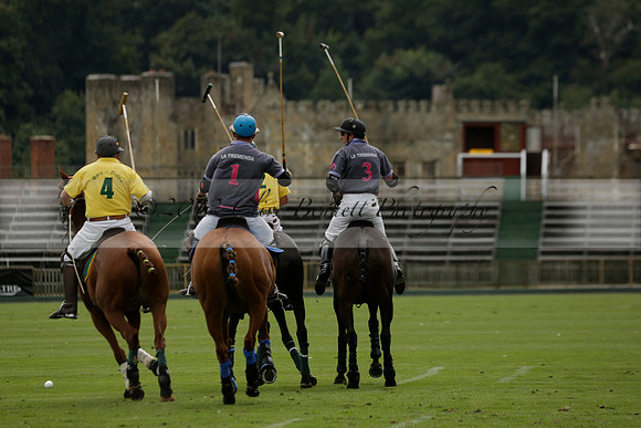 La Tremenda (lilac) v Maiz Dulce (yellow) in a Brecknock Cup polo match played on Lawns 1 at the Cowdray Park Polo Club on Tuesday 13 August 2013
