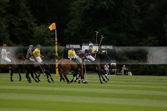 La Tremenda (lilac) v Maiz Dulce (yellow) in a Brecknock Cup polo match played on Lawns 1 at the Cowdray Park Polo Club on Tuesday 13 August 2013