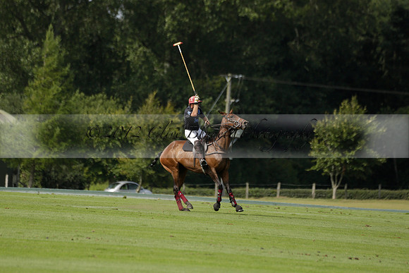 Maiz Dulce (green) v River (blue) in a Uber Polo Midsummer 12 goal polo match on Wednesday 21 August 2013 at Cowdray park Polo Club on Ambersham 2.  www.polopictures.co.uk