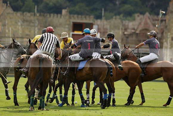 La Tremenda (lilac) v Maiz Dulce (yellow) in a Brecknock Cup polo match played on Lawns 1 at the Cowdray Park Polo Club on Tuesday 13 August 2013