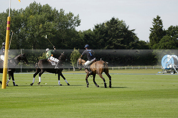 Maiz Dulce (green) v River (blue) in a Uber Polo Midsummer 12 goal polo match on Wednesday 21 August 2013 at Cowdray park Polo Club on Ambersham 2.  www.polopictures.co.uk