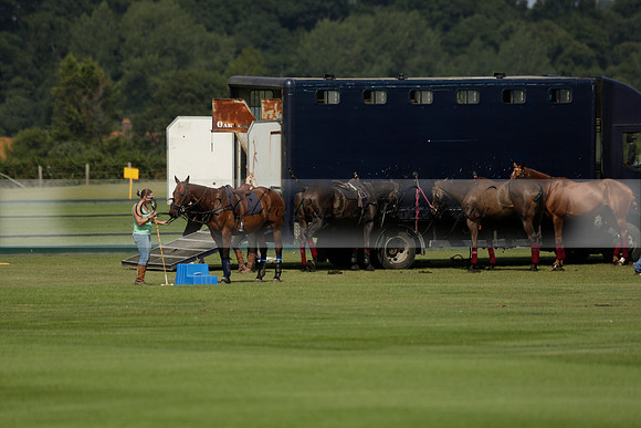 Maiz Dulce (green) v River (blue) in a Uber Polo Midsummer 12 goal polo match on Wednesday 21 August 2013 at Cowdray park Polo Club on Ambersham 2.  www.polopictures.co.uk