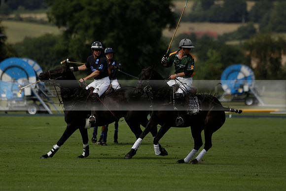 Maiz Dulce (green) v River (blue) in a Uber Polo Midsummer 12 goal polo match on Wednesday 21 August 2013 at Cowdray park Polo Club on Ambersham 2.  www.polopictures.co.uk