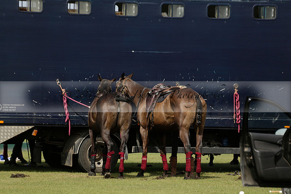 Maiz Dulce (green) v River (blue) in a Uber Polo Midsummer 12 goal polo match on Wednesday 21 August 2013 at Cowdray park Polo Club on Ambersham 2.  www.polopictures.co.uk