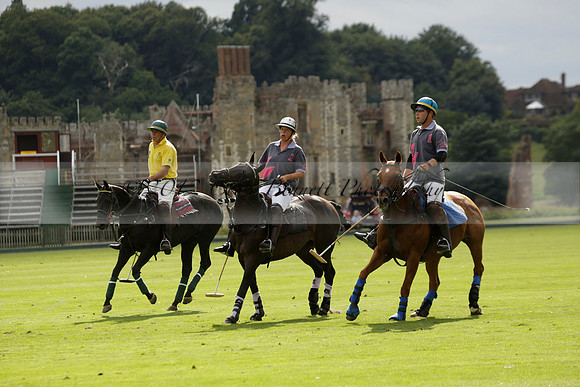 La Tremenda (lilac) v Maiz Dulce (yellow) in a Brecknock Cup polo match played on Lawns 1 at the Cowdray Park Polo Club on Tuesday 13 August 2013